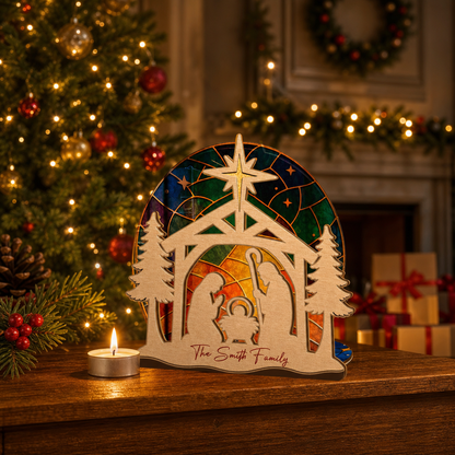 Personalized nativity family name suncatcher candle holder glowing on holiday table