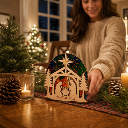 Personalized nativity family name suncatcher candle holder glowing on holiday table