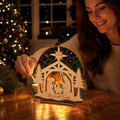 Personalized nativity family name suncatcher candle holder glowing on holiday table