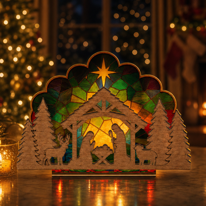 Christmas nativity suncatcher candle holder glowing on holiday table