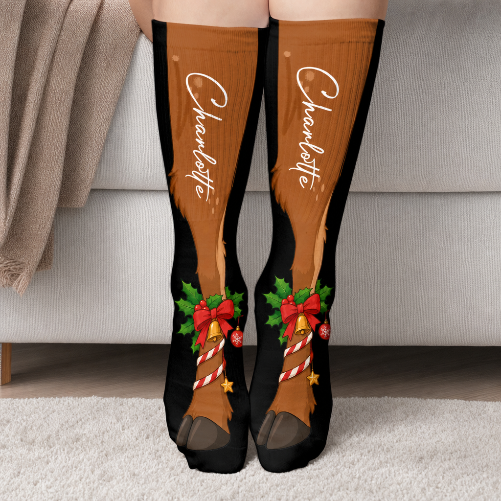 Personalized Reindeer Legs Christmas Socks worn on a cozy sofa by the Christmas tree