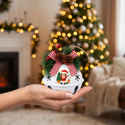 Hand holding a custom Santa kid photo jingle bell ornament