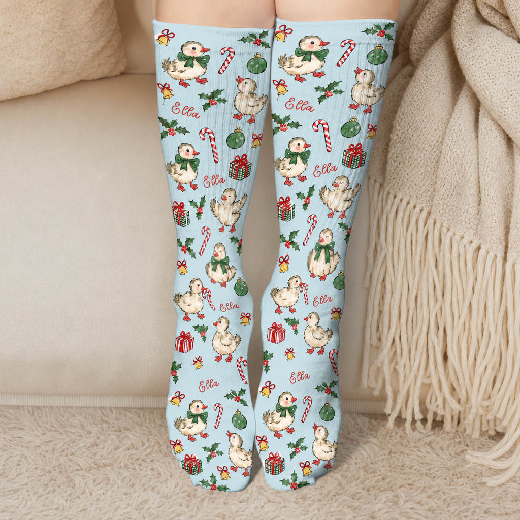 Personalized Christmas Duckling Pattern Socks worn on a cozy sofa by the Christmas tree
