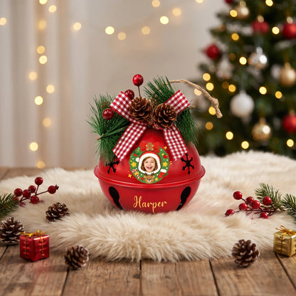 Personalized Christmas wreath kid photo jingle bell ornament on a festive table