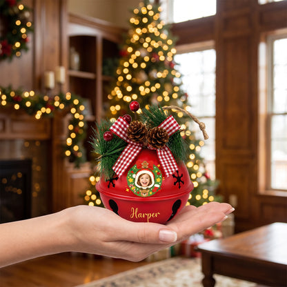 Hand holding a custom Christmas wreath kid photo jingle bell ornament